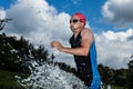 Triathlete is comming out of the water