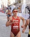 Triathlete Nicola Spirig running, followed competitors