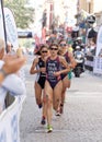 Triathlete Sarah True running, followed competitors