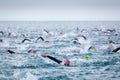 Triathletes in water in the Ironman triathlon competition at Calella beach Royalty Free Stock Photo