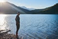 Triathlon athlete starting swimming training on lake Royalty Free Stock Photo