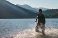 Triathlon athlete starting swimming training on lake Royalty Free Stock Photo