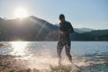 Triathlon athlete starting swimming training on lake Royalty Free Stock Photo