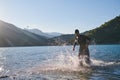 Triathlon athlete starting swimming training on lake Royalty Free Stock Photo