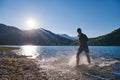 Triathlon athlete starting swimming training on lake Royalty Free Stock Photo