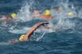 Triathlon swimmers inthe open sea