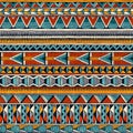 Tribal african ornament in vibrant colours. Seamless abstract vector background.