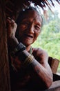 Tribal elder man enjoying the afternoon rest at his home in the jungle