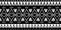 Tribal ethnic seamless pattern with black and white colors. Background traditional symbol drawing for fashion textile print and Royalty Free Stock Photo