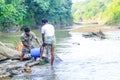 Tribal fishermen catch fish with fishing nets in the creek. Tribals have their own method of fishing.