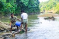 Tribal fishermen catch fish with fishing nets in the creek. Tribals have their own method of fishing.