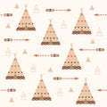 Tribal geometric seamless pattern with arrows and feathers. Wigwam background pattern.