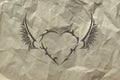 Tribal heart on crushed paper background