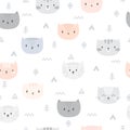 Tribal seamless pattern with cartoon cats. Abstract geometric art print. Hand drawn ethnic background with cute animals Royalty Free Stock Photo