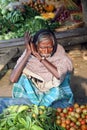 Tribal villagers bargain for vegetables. Sonakhali, India