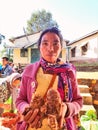 Tribal woman farmer with organic vegetable