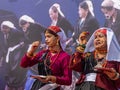 Tribal women of Uttarakhand wearing traditional attire and dancing Royalty Free Stock Photo