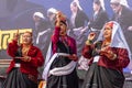 Tribal women of Uttarakhand wearing traditional attire and dancing Royalty Free Stock Photo