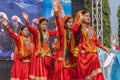 Tribal women of Uttarakhand wearing traditional attire and dancing Royalty Free Stock Photo