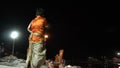 Ganga aarti being performed by Hindu priests to the chants of Vedic hymns.