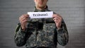 Tribunal word written on sign in hands of male soldier, military court, crime Royalty Free Stock Photo