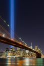 Tribute in Light with the Brooklyn Bridge and the skycrapers of Lower Manhattan. Financial District, New York City Royalty Free Stock Photo