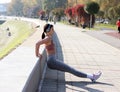 Triceps workout. At the street. Fit girl . Love sport .