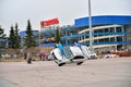 The trick is to replace the wheels on a moving car during the show Lada-truck Rodeo thing in St. Petersburg