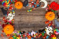 Colorful halloween candies on wood