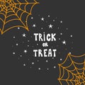 Trick or treat typography with cobweb background