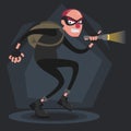 A balding thief wearing a mask smiles and sneaks with a flashlight in the dark Royalty Free Stock Photo