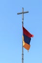 Armenia, Khor Virap, September 2021. Armenian flag on a pole with a cross. Royalty Free Stock Photo