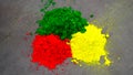 Tricolor Heap of Yellow, red or Green for Hindu festival of Holi or Dhulandi use. Herbal dye colors for the festival of Dhulandi