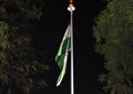 A tricolour of Indian national waves in front of train station in Bhusawal, MH. Night View