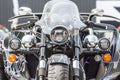 Chromed three-wheeled motorcycle front view close-up Royalty Free Stock Photo