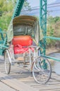 Tricycle thai style on Bridge over Pai River at Pai at Mae Hong Royalty Free Stock Photo