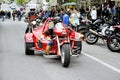 A tricycle to a gathering of American motorcycle