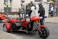 A tricycle to a gathering of American motorcycle