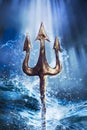 Trident on a dramatic background Royalty Free Stock Photo