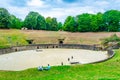 TRIER, GERMANY, AUGUST 14, 2018: People strolling through old roman amphitheater in Trier, Germany