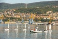 Sailing school in Trieste. Kids learning to sail on sea yacht