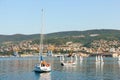 Sailing school in Trieste. Kids learning to sail on sea yacht