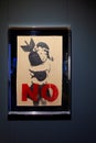 Artwork of the Series of Signs of cardboard titled Bomb Hugger by Banksy, Salone degli Incanti. Trieste