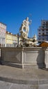 Trieste, Italy - October 1, 2023: Trieste, Italy - Neptune sculpture in the famous Piazza della Borsa Exchange Square