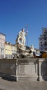 Trieste, Italy - October 1, 2023: Trieste, Italy - Neptune sculpture in the famous Piazza della Borsa Exchange Square