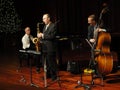Trifecta Jazz Band Trio Playing at the Temple Royalty Free Stock Photo