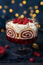 Trifle. Festive layered dessert with berry jelly, swiss roll cake and whipped cream Royalty Free Stock Photo