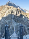 Trift, Switzerland - October 18th 2022: Spectacular rope bridge Triftbruecke crossing a canyon Royalty Free Stock Photo