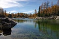 Triglav autumn larches Dolina Triglavskih Jezer lakeside Royalty Free Stock Photo