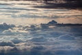 Triglav peak above sunlit sea of clouds, Julian Alps, Slovenia Royalty Free Stock Photo